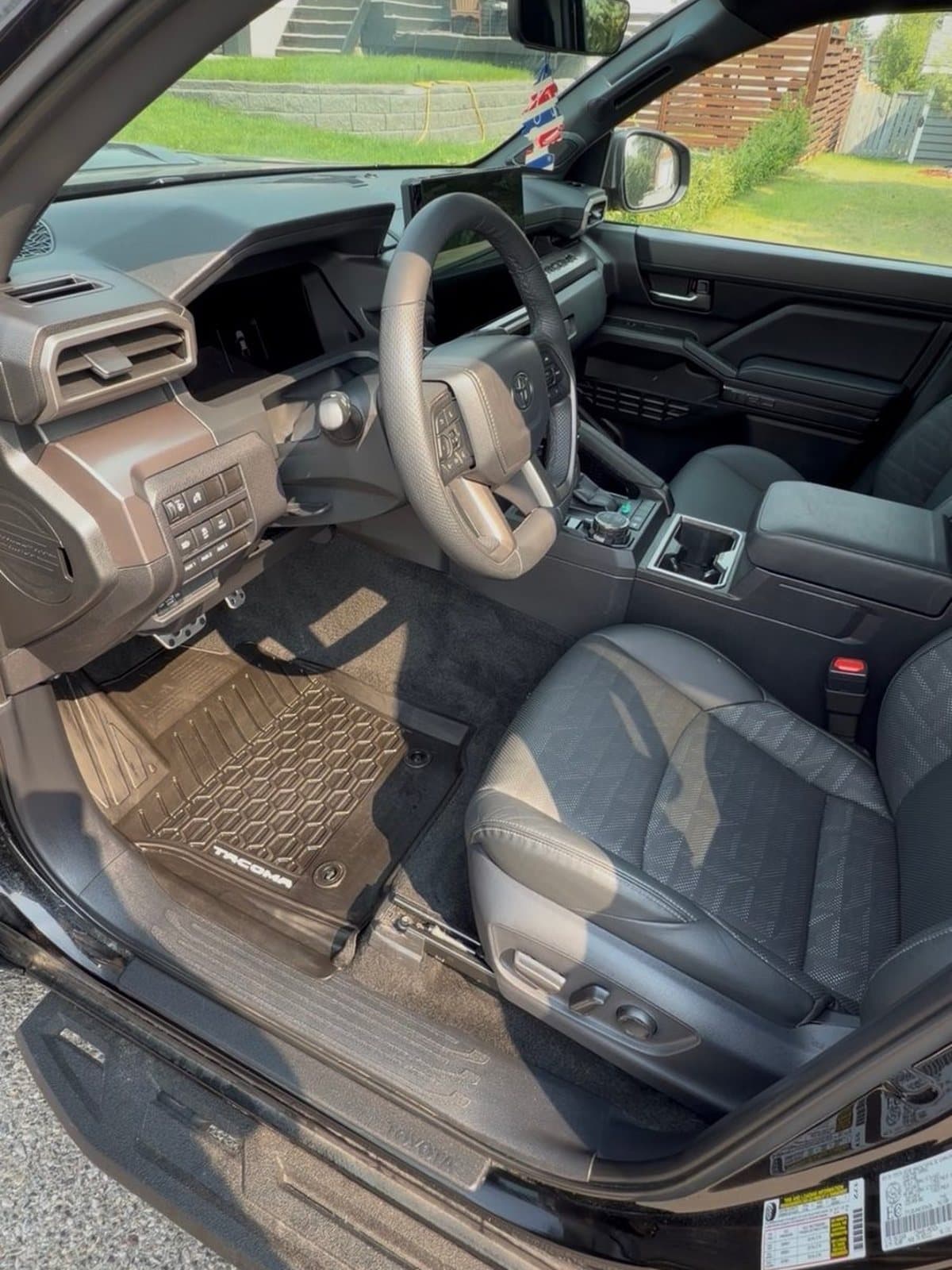The same Tacoma after detailing, dash and floor mat clean and dust free